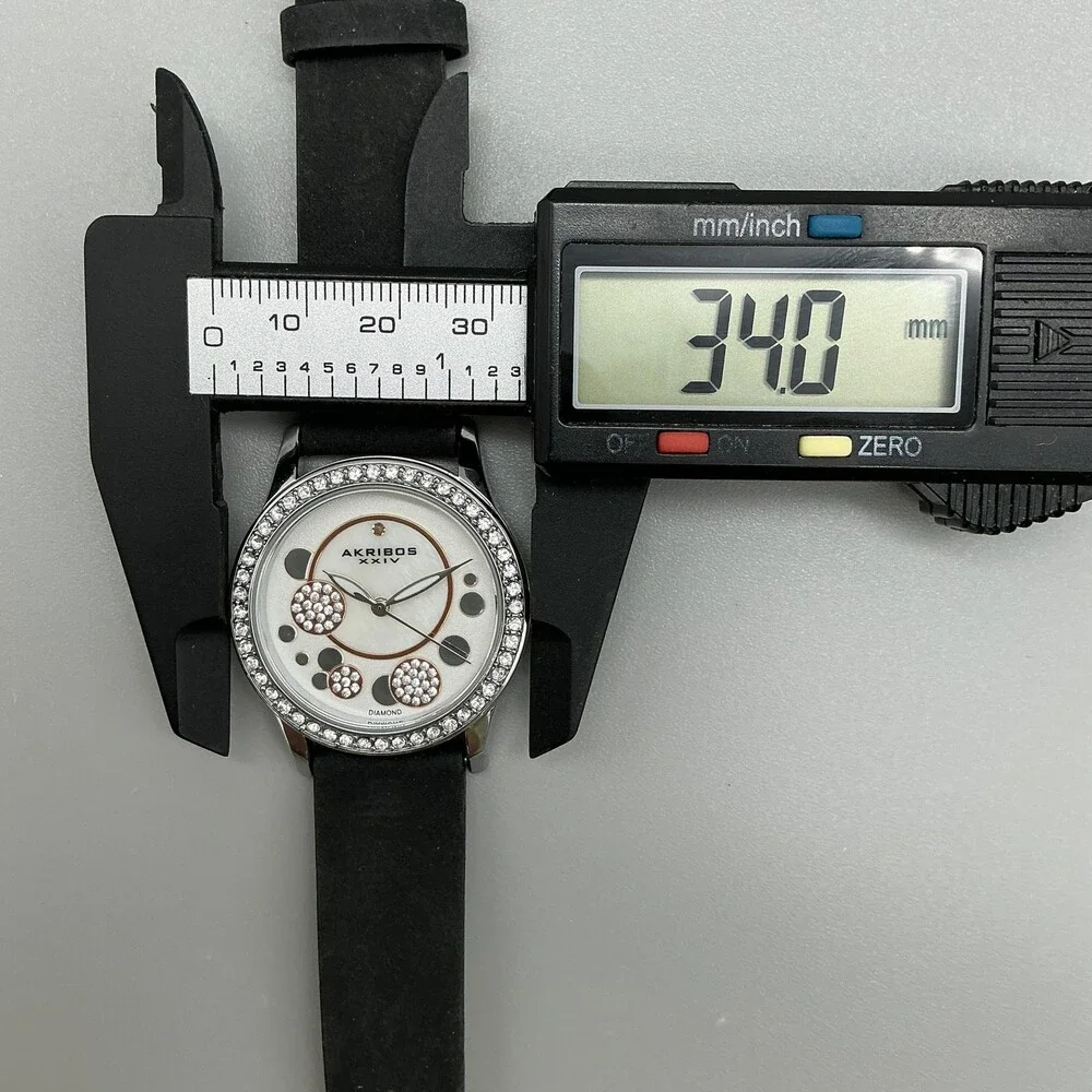 Akribos XXIV Womens Watch 34mmSilver Tone MOP Leather Crystals New Battery